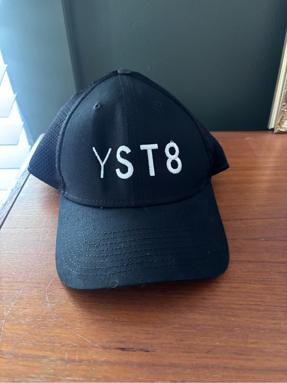 Black Trucker Hat with White YST8 Embroidery